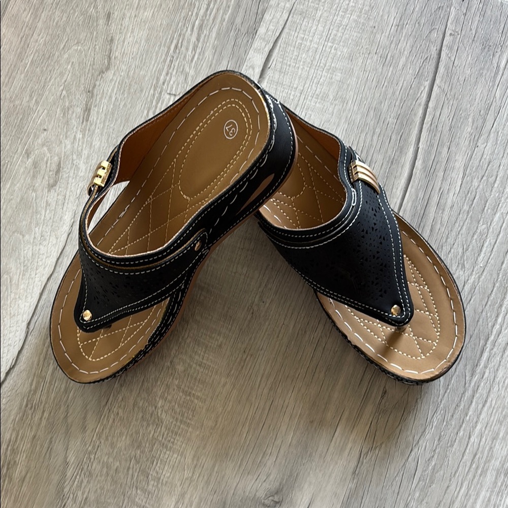 Chic Black and Tan Sandals with Gold Details